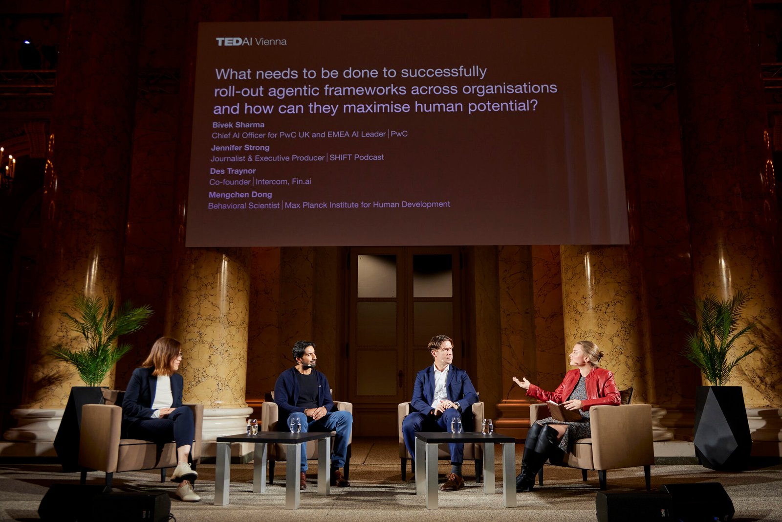 Jennifer Strong moderating the TED AI panel in Vienna
