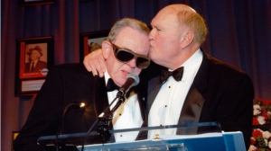 Walker gets a kiss from Scott at the Radio Hall of Fame ceremony honoring Walker in 2010. 